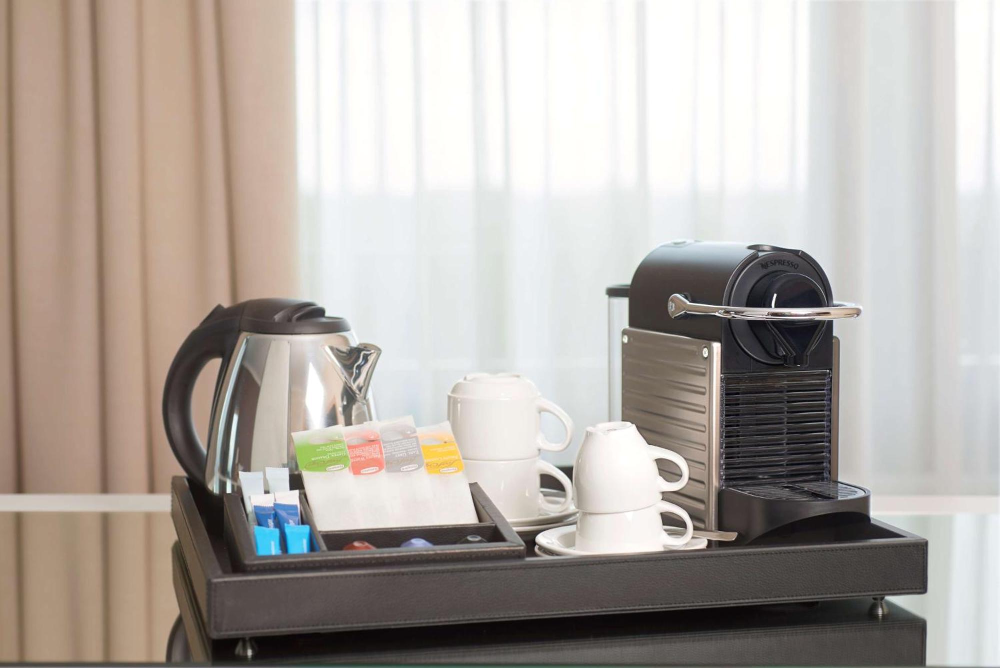 Nh Collection Plaza Santiago Ξενοδοχείο Εξωτερικό φωτογραφία A Nespresso coffee machine in a hotel room